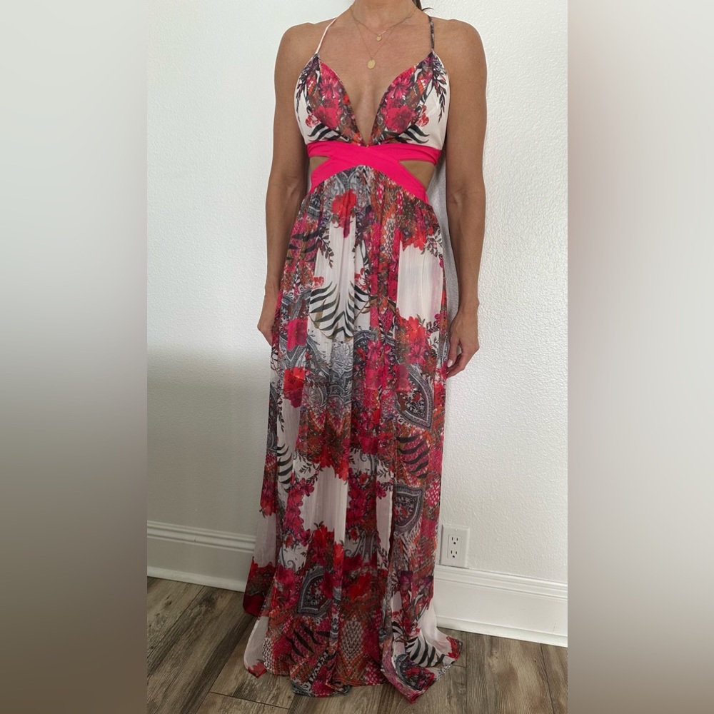 Maxi dress with side cutout and open back. Size M